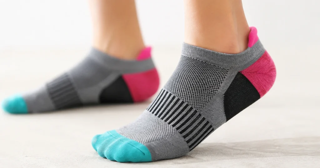 Women's athletic socks with cushioning arch bands mesh ventilation and crew styles